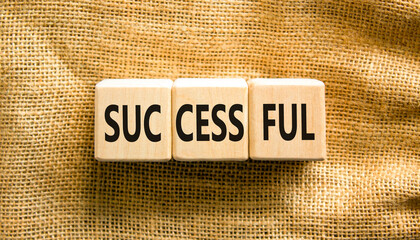 Successful symbol. Concept word Successful on beautiful wooden blocks. Beautiful canvas background. Business successful concept. Copy space.