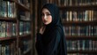 © Terablete - A woman in a black dress stands confidently among tall bookshelves in a library during daylight