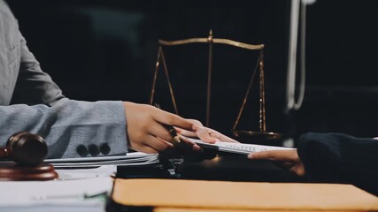 Wall Mural - Business and lawyers discussing contract papers with brass scale on desk in office. Law, legal services, advice, justice and law concept picture with film grain effect