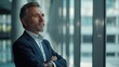 © Lab_Photo - Happy Confident Mature Businessman Investor Standing in Office: Thinking About Future Success