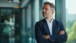 © Lab_Photo - Happy Confident Mature Businessman Investor Standing in Office: Thinking About Future Success