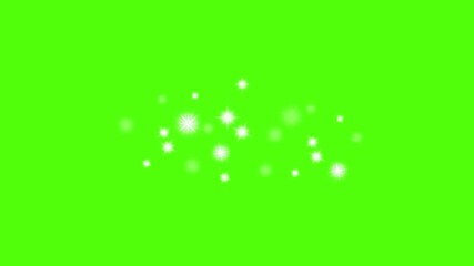 Wall Mural - glowing starlight sparkle on green screen background. shimmering light effect. sparkling stars isola