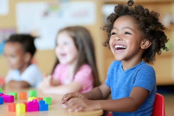 Sticker - A group of children are sitting at a table with blocks in front of them. One of the children is smiling and laughing