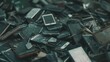 © VK Studio - A heap of broken and discarded smartphones, highlighting electronic waste and environmental issues related to technology.
