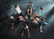 © Haas/peopleimages.com - Group, circle and sit ups training for workout, exercise and gym class, club or core fitness for challenge. People, personal trainer or friends collaboration for weight loss, endurance or health