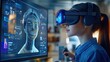 © Pic - A young woman in a blue shirt uses a VR headset while looking at a computer screen showing a 3D model of a female face.