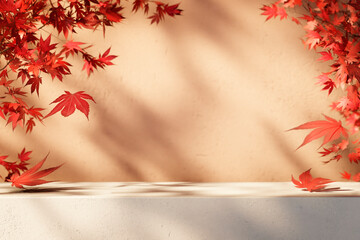 Wall Mural - Autumn background scene with red maple leaves on table with sunlight. Natural seasonal home decor for fall season, thanksgiving and holiday showroom.