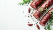 © 2rogan - Traditional smoked sausage on a white background with copy space