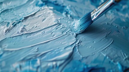 Canvas Print - A close-up of light blue paint being brushed onto a canvas, with soft strokes and texture