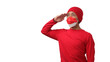 © Jamaludinyusup - Young Indonesian man, wearing a red and white mask, makes a salute gesture while celebrating Indonesia's Independence Day on 17 August. The scene is isolated on a white background.