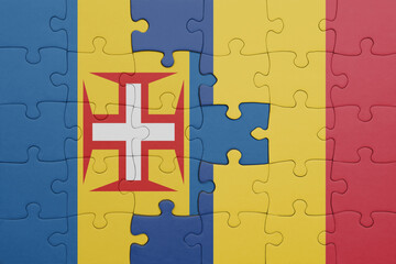 puzzle with the colourful national flag of romania and flag of madeira.