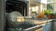 © horizon - Open dishwasher in modern kitchen, bright lighting, clean dishes neatly arranged, stainless steel interior, white ceramic plates, glasses, domestic appliance, contemporary home.