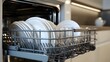 © horizon - Open dishwasher in modern kitchen, bright lighting, clean dishes neatly arranged, stainless steel interior, white ceramic plates, glasses, domestic appliance, contemporary home.