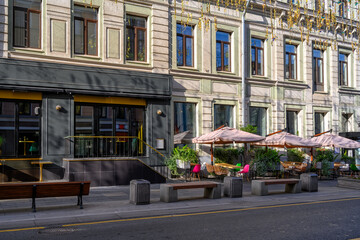 Wall Mural - bolshaya dmitrovka street with tables of cafe in moscow, russia. moscow architecture and landmark. m