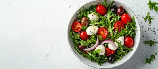 Poster - Close up of a fresh salad featuring arugula tomatoes olives onion mozzarella and spices in a bowl on a white stone background Concepts of healthy food diet detox clean eating or vegetarianism
