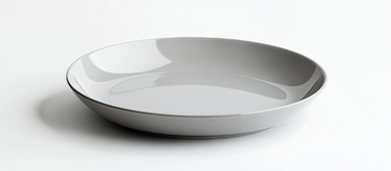 Fototapete - Isolated empty grey circle ceramic plate on a white background with a clipping path. with copy space image. Place for adding text or design