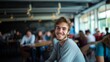 © vlntn - Smiling Young Man in Café