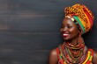 © Katsyarina - A beautiful African woman in a traditional costume, portrait. Bright clothes. Africa Day. Black History Month