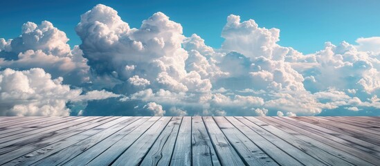 cloud service idea featuring clouds on a wooden surface top view copy space