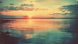 © sarun - A vintage film photograph of a coastal sunset, the colors soft and the mood reflective.