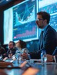 © Анатолий Сав - A financial expert presents key insights in a contemporary conference room, with charts displayed on large screens and an engaged audience participating. Generative AI