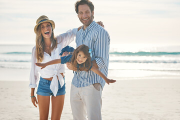 Poster - Playing, beach and portrait of child with parents for holiday, vacation and weekend by ocean. Family, happy and girl, mother and father for airplane games for bonding, playful relationship and fun