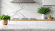 © organik - Empty white marble table with minmal white blurred kitchen background for product mockup