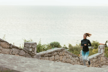 Poster - Girl Jogging By the Ocean