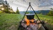 © Brocz Studio - Cooking in a pot over campfire