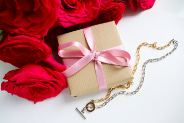 gift concept. beautiful gift boxes with bows and a bouquet of red roses