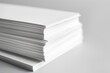 © Valentin - A Neat Stack of Blank White Paper Ready for Creativity