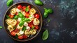 © Nijat - bowl of tortellini pasta with tomato mozzarella and basil italian cuisine