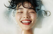 © Michael - Happy Assian woman with closed eyes smiling while taking bath with milk. Luxury beauty concept