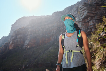 Poster - Nature, backpack and woman hiking in mountain for adventure, fitness or discovery for geology. Mask, exercise and female person trekking for outdoor hobby, workout or activity by rocks in New Zealand