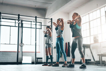 Poster - Fitness, women and exercise with kettlebell for weight training, wellness and body workout. Team, cardio and personal trainer challenge with active routine for health group at class in gym center