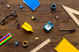 Fototapeta Tulipany - Creative flat lay with school supplies and stationery, top view