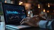 © Johannes - Man using laptop data analysis focusing on growing sales graph business data analytics Concept Business Analytics