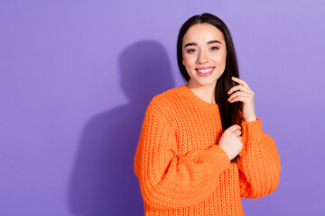 Wall Mural - Photo of cute pretty cheerful girl wear trendy orange clothes empty space poster isolated on purple color background