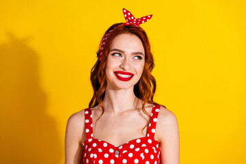 Canvas Print - Photo of charming pretty lady wear red dress look empty space isolated on vivid yellow background