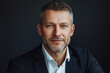 © Enrique - happy, portrait of a businessman in his 40s, looking at the camera, random clothes. modern style