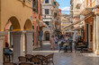 © robertharding - View of shops and cafes in narrow street, Corfu Town, Corfu, Ionian Sea, Greek Islands, Greece