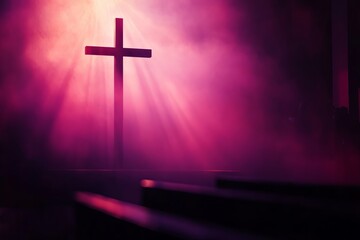 Christian cross silhouette in radiant purple and pink light. Religion and worship concept.