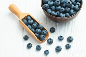 Wall Mural - Blueberry photography in a bowl on rustic background