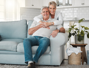 Wall Mural - Love, senior couple and portrait on sofa with hug, connection and bonding together in home. House, woman and man on couch in retirement, commitment and security and embrace support in marriage