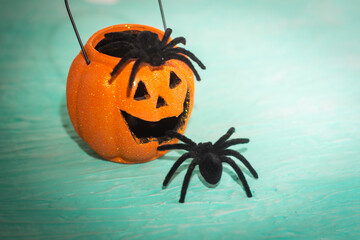 halloween pumpkin with two realistic spooky spider. traditional autumn holiday. creepy design.