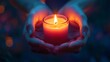 © Sunisa - A close-up of a worker's hands holding a lit candle during a Labor Day vigil, with a focus on the warm light illuminating their determined expression