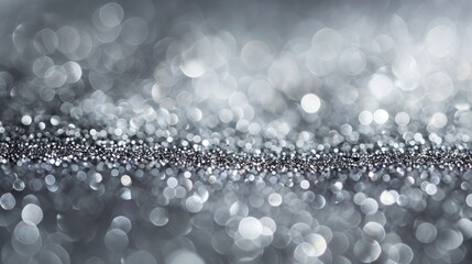 Wall Mural - a close up of silver glitter on a table