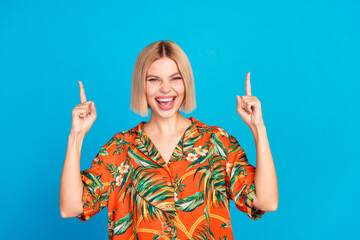 Poster - Photo of funky funny nice adorable girl wear stylish print clothes introduce empty space isolated on blue color background