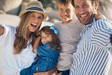 Poster - Family, portrait and selfie on beach for travel, holiday and bonding together in summer while carrying. Mom, dad and kids by ocean for fun trip, vacation and social media with happiness and memory