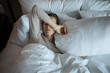 © kieferpix - Young woman waking up in the morning feeling tired suffering from insomnia bad sleep
